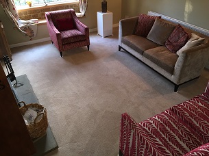 wool carpet fully cleaned and furniture returned to positions